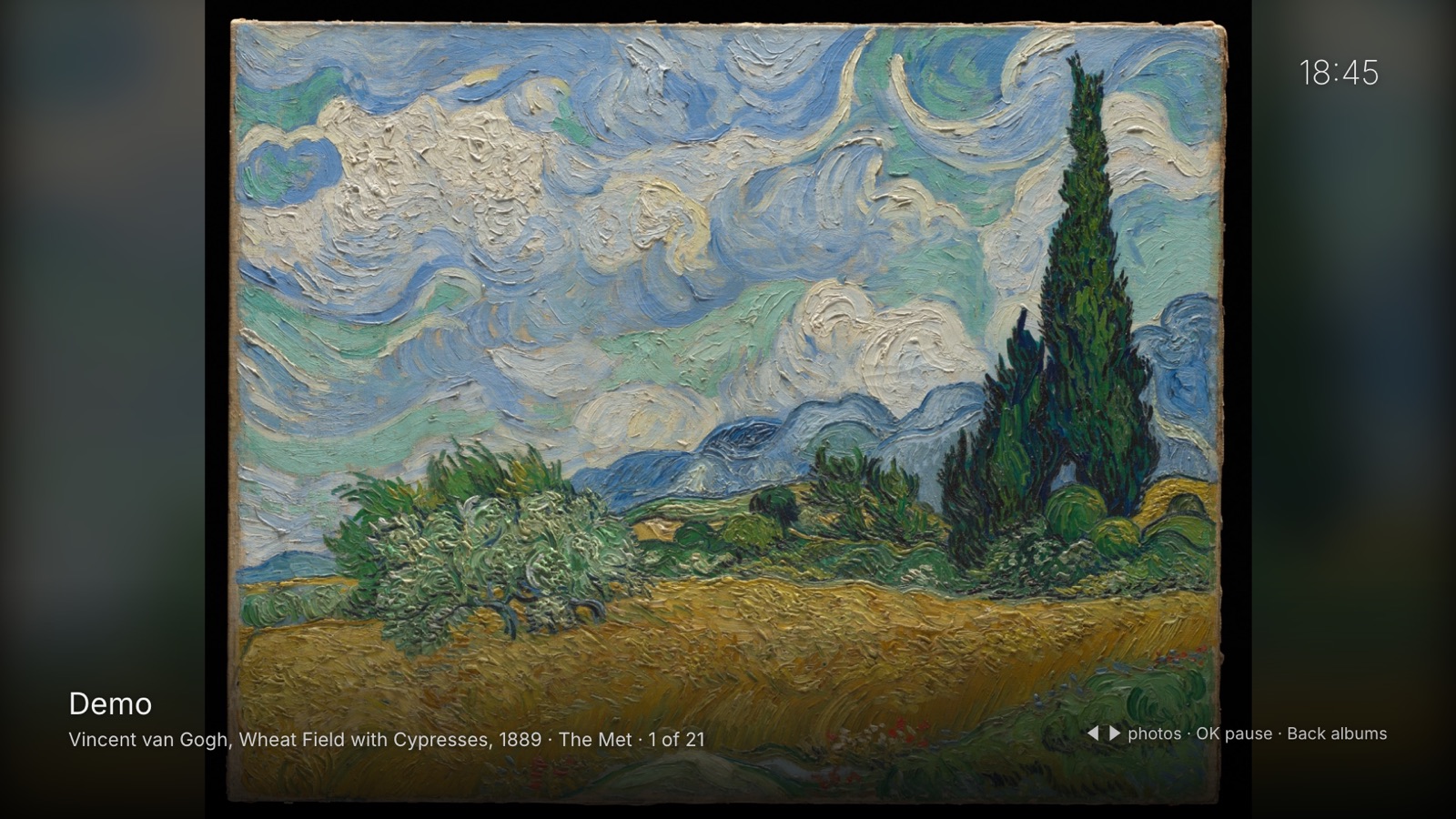 A Van Gogh painting filling the TV screen, with the album name, the caption and the time