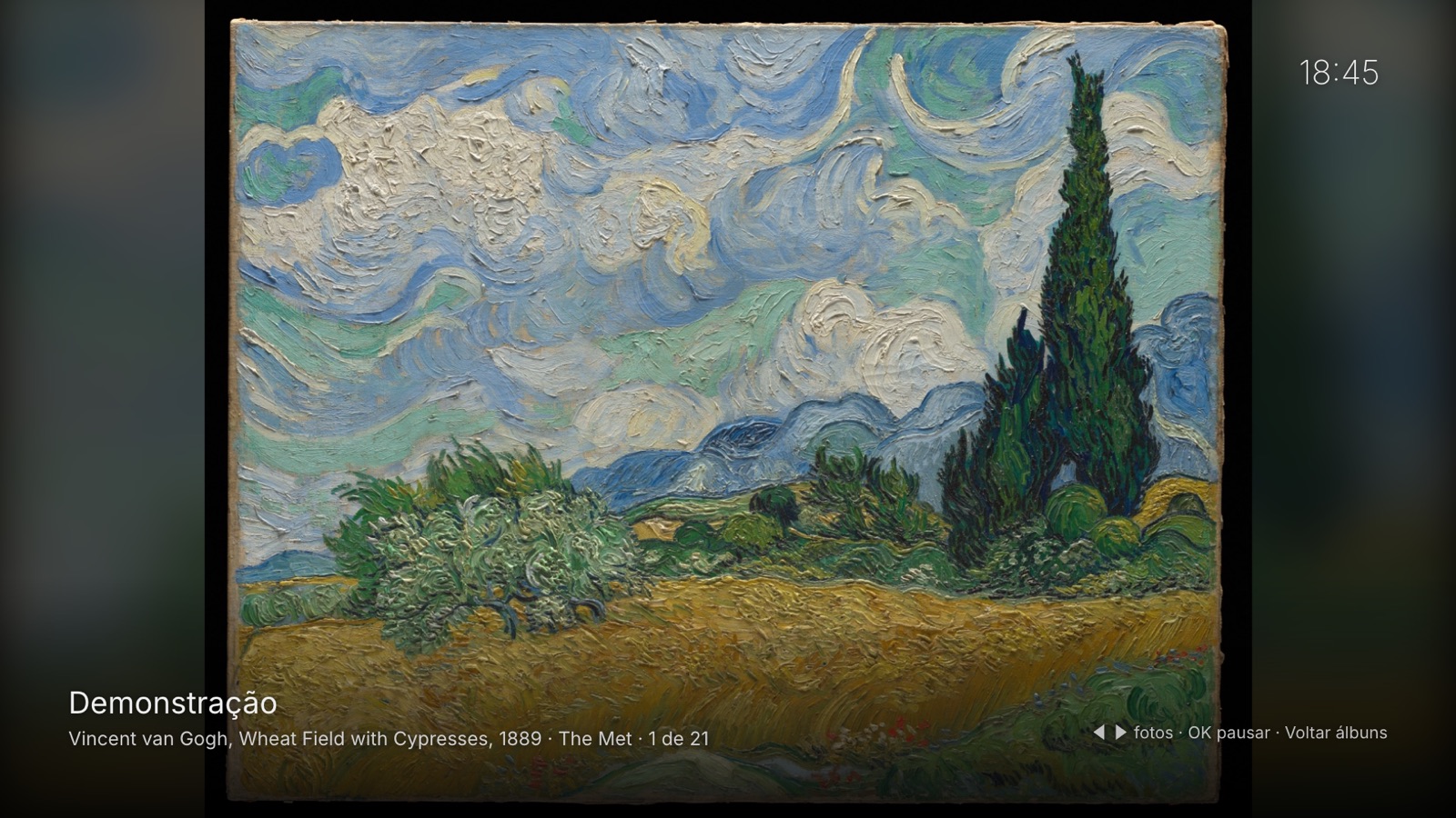 Um quadro de Van Gogh ocupando a tela da TV, com o nome do álbum, a legenda e a hora